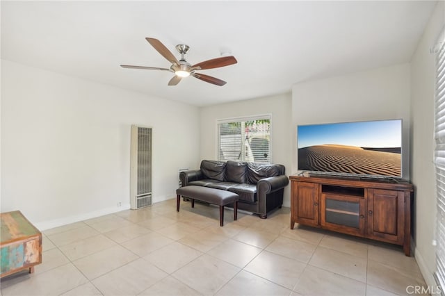 tiled living room featuring ceiling fan