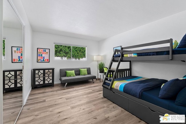 bedroom with light wood-type flooring