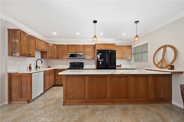 kitchen featuring hanging light fixtures, sink, black appliances, a center island, and crown molding