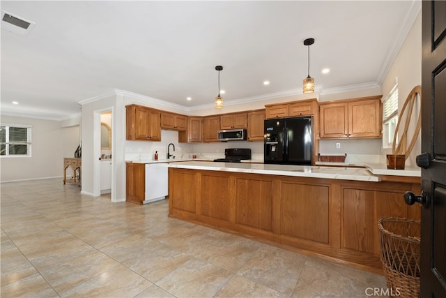 kitchen with kitchen peninsula, ornamental molding, black appliances, pendant lighting, and sink