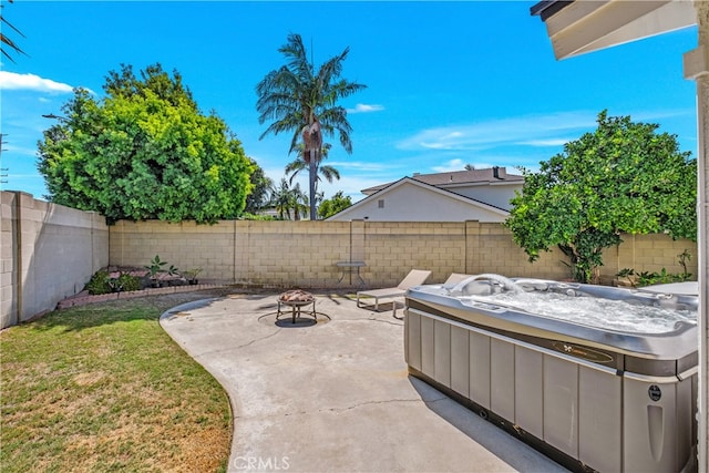 view of patio / terrace featuring a hot tub