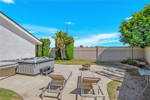 view of patio with a hot tub