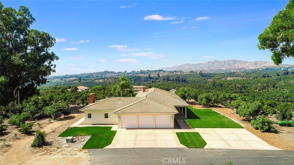 aerial view featuring a mountain view