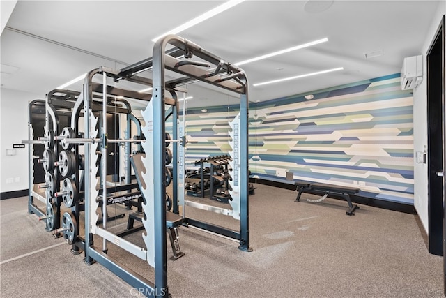 exercise room with a wall unit AC