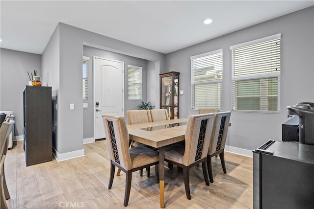 dining room with light hardwood / wood-style flooring