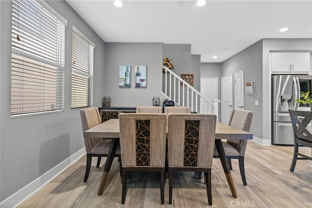 dining room featuring light hardwood / wood-style floors