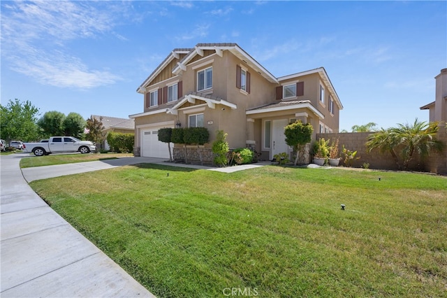 view of front of home with a garage and a front yard