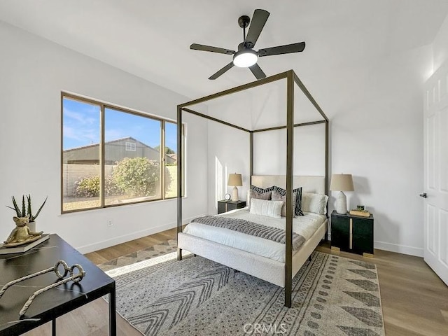 bedroom featuring wood-type flooring and ceiling fan