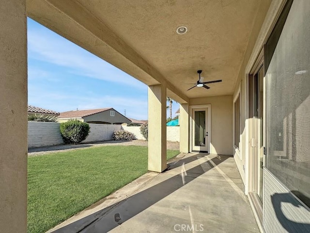 view of patio / terrace featuring ceiling fan