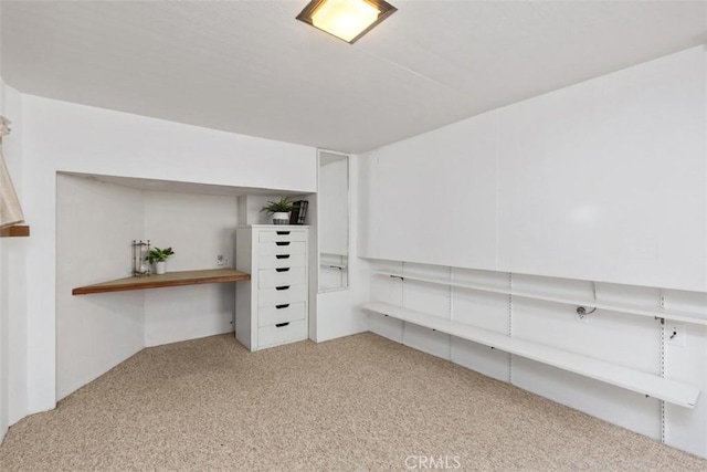 basement with light colored carpet