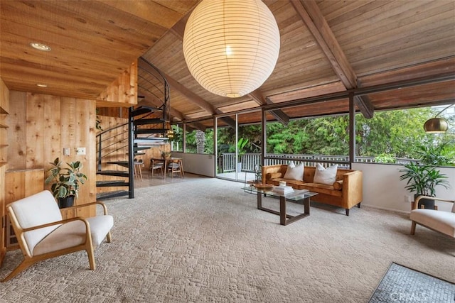 unfurnished sunroom with lofted ceiling with beams and wooden ceiling