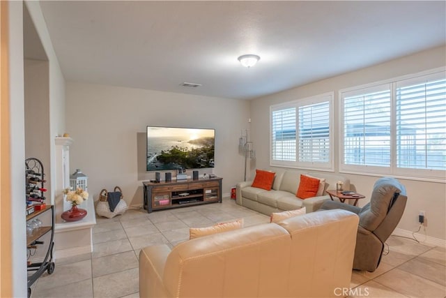 living room featuring light tile patterned floors