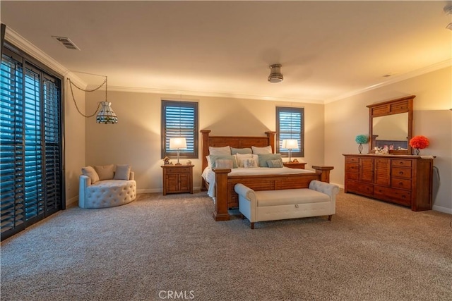 carpeted bedroom with ceiling fan and crown molding