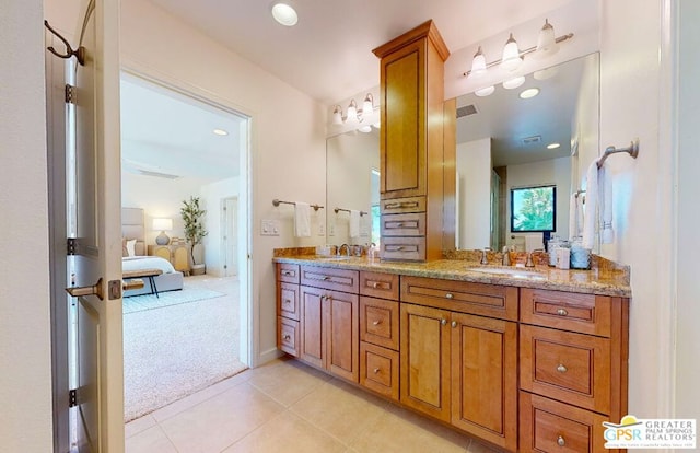 bathroom featuring vanity and tile patterned flooring