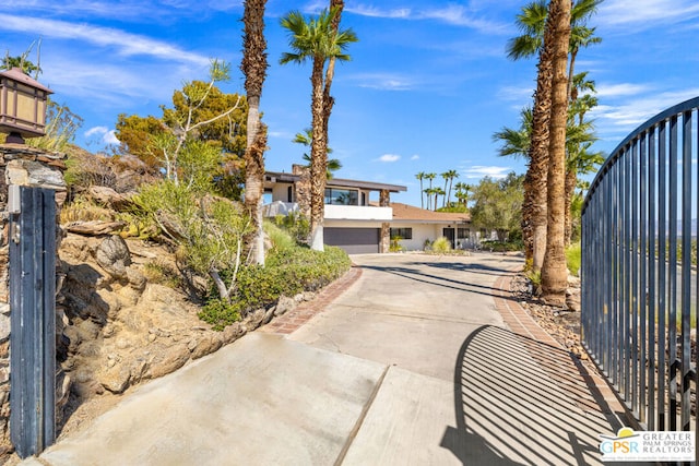 view of front of property with a garage