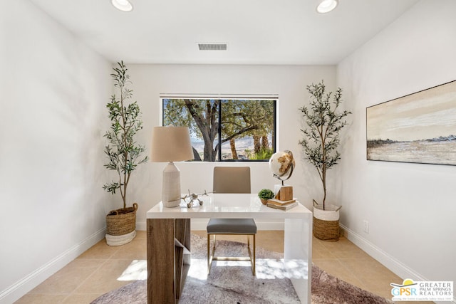 office area with light tile patterned floors