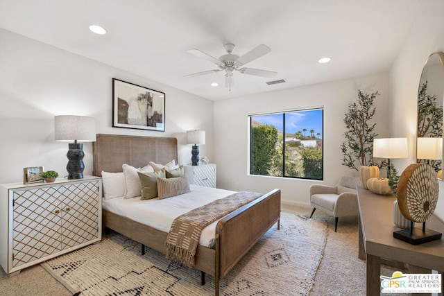 carpeted bedroom featuring ceiling fan