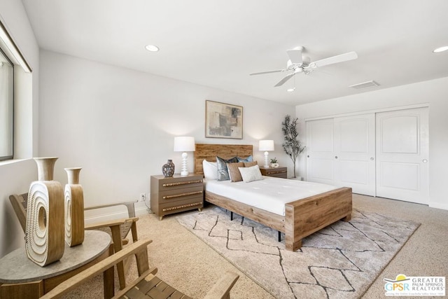 bedroom with ceiling fan and a closet