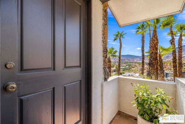 balcony featuring a mountain view