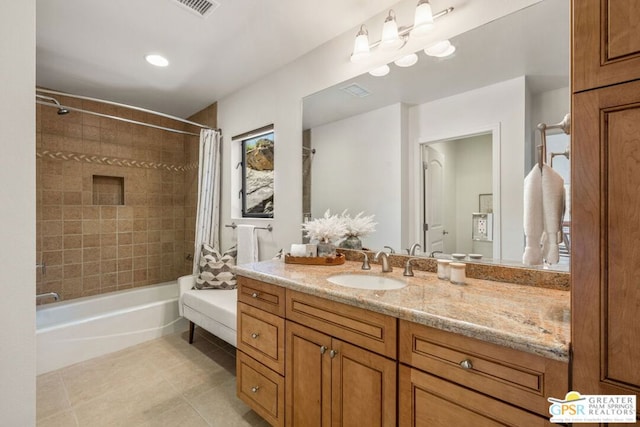 bathroom featuring vanity, shower / bathtub combination with curtain, and tile patterned flooring