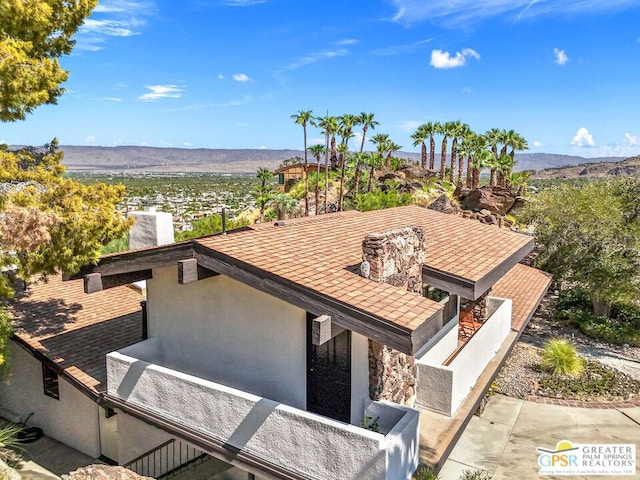 exterior space with a mountain view