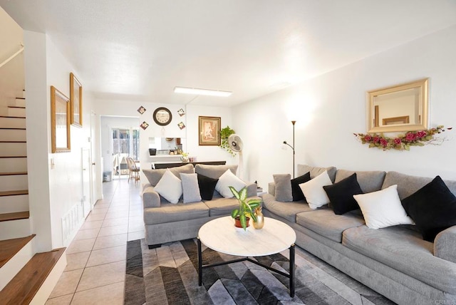 living room featuring tile patterned flooring