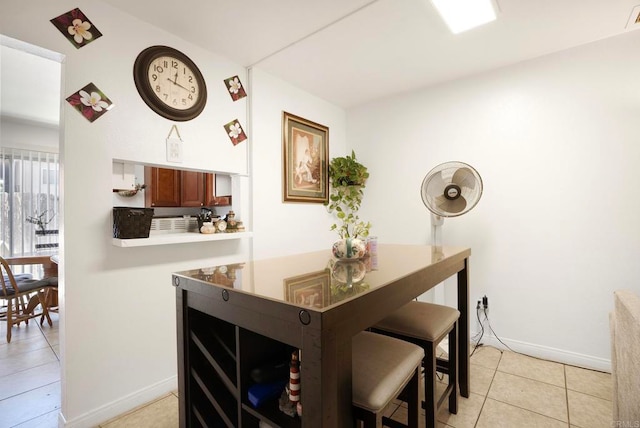 dining room with light tile patterned floors