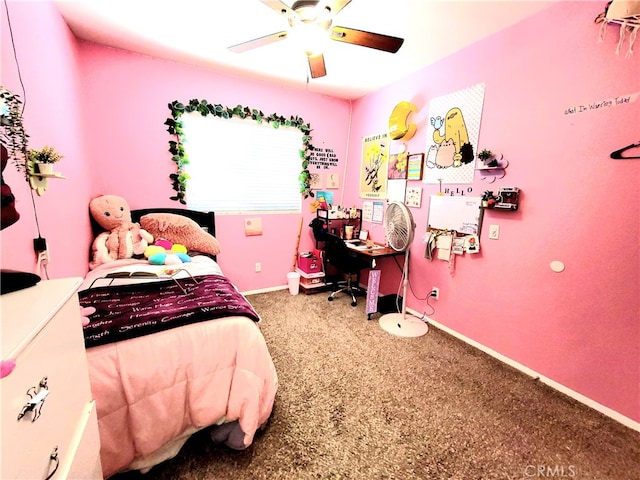 bedroom featuring ceiling fan and carpet