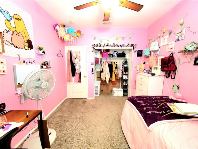 carpeted bedroom with ceiling fan and a closet