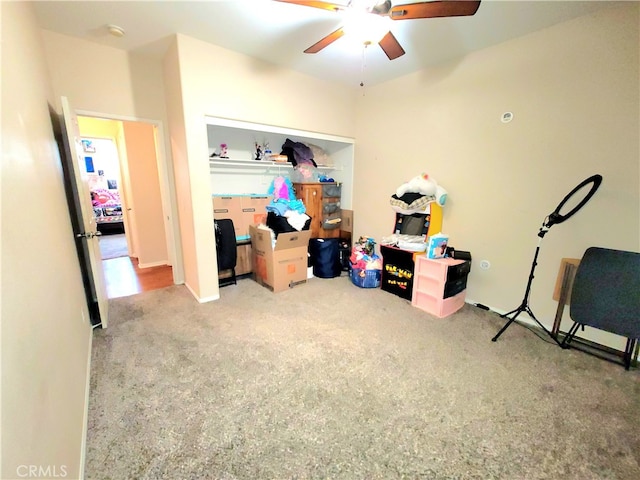 carpeted bedroom featuring ceiling fan