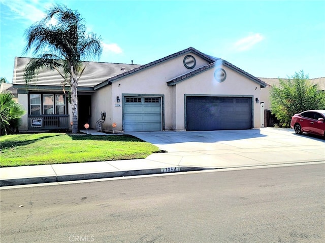 ranch-style home with a garage and a front lawn