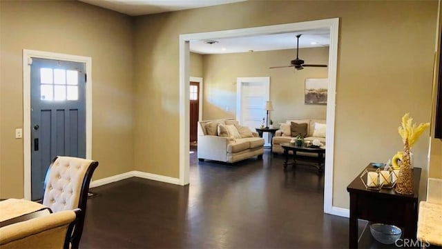 foyer featuring ceiling fan