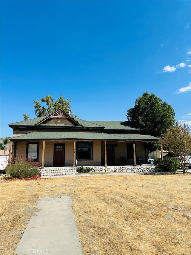 view of front of home featuring covered porch