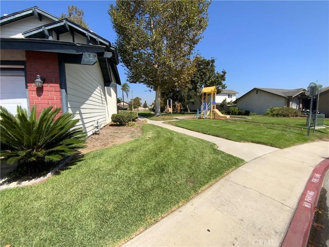 view of yard with a playground