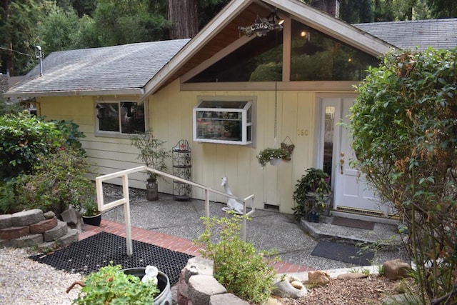 property entrance with a patio