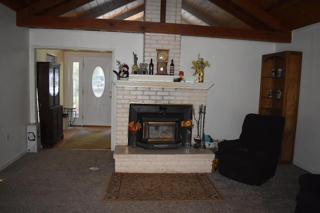 carpeted living room with lofted ceiling with beams