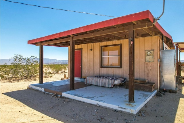 view of outbuilding with a mountain view