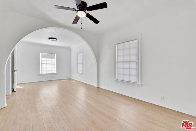 interior space with light wood-type flooring and ceiling fan