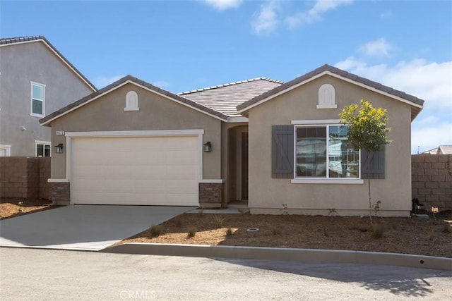 9665 Larimar Ct, Riverside, CA 92508 - single story home with fence, a tile roof, concrete driveway, a garage, and stucco siding