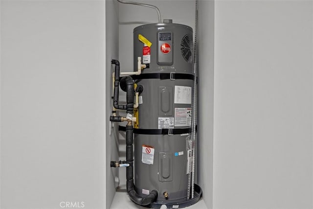 9665 Larimar Ct, Riverside, CA 92508 - utility room featuring hybrid water heater