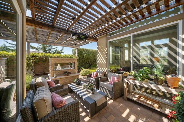 view of patio featuring a pergola and outdoor lounge area