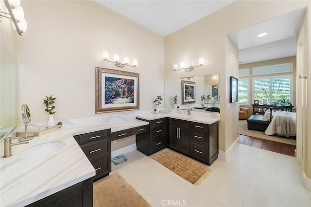 bathroom with hardwood / wood-style flooring and vanity