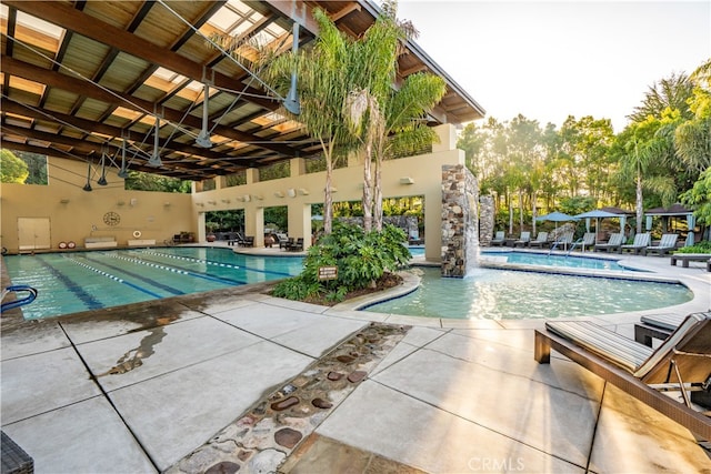 view of swimming pool featuring a patio area