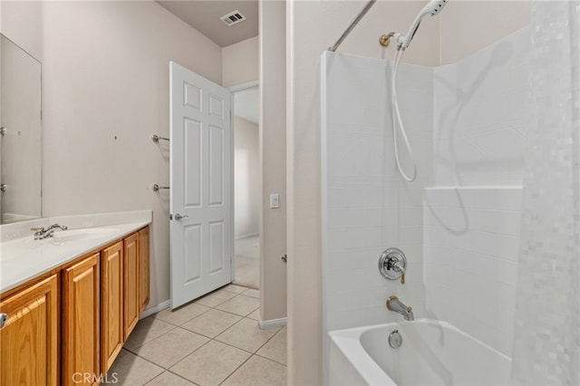 bathroom with shower / bath combo, vanity, and tile patterned floors