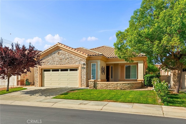 mediterranean / spanish-style home featuring a garage and a front lawn