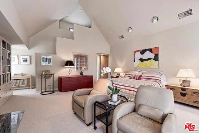 carpeted bedroom featuring high vaulted ceiling