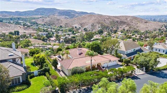 aerial view featuring a residential view and a mountain view