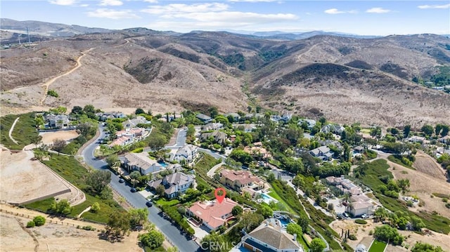 aerial view featuring a residential view and a mountain view