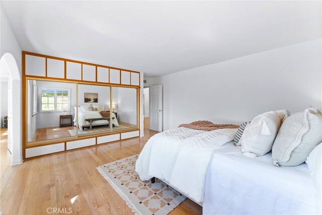 bedroom with light hardwood / wood-style flooring