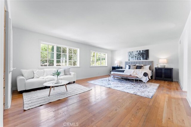 bedroom with light wood-type flooring